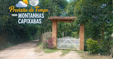 Entrada de sítio nas montanhas capixabas em dia de sol, com vegetação tropical e estrada de terra, ilustrando a previsão do tempo na região com clima agradável e céu parcialmente nublado.